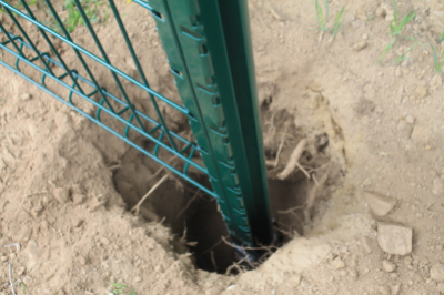 betonner poteau cloture